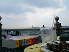 Nice view for lunch (in the background: the Statue of Liberty)