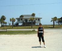 Caro, in front of the  houses along the Gulf Coast